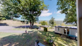 CAMPING LA POMMERAIE 4*, Camping à Vic sur Cère (Cantal) - Location Mobil Home pour 4 personnes - Photo N°3