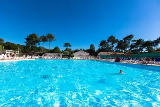 Camping Côté Ô La Palmyre 4*, Camping 4* à Les Mathes (Charente Maritime) - Location Chalet pour 4 personnes - Photo N°5