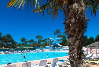 Camping Côté Ô La Palmyre 4*, Camping 4* à Les Mathes (Charente Maritime) - Location Chalet pour 4 personnes - Photo N°7