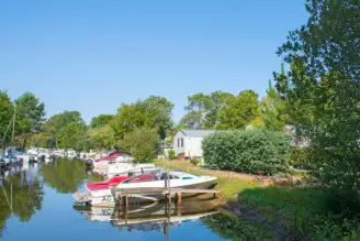 Camping Le Navarrosse 4*, Camping 4* à Biscarrosse (Landes) - Location Bungalow pour 6 personnes - Photo N°14
