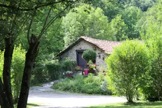 Camping Moulin de Chaules 3*, Camping 3* à Saint Constant (Cantal) - Location Tente équipée pour 4 personnes - Photo N°4