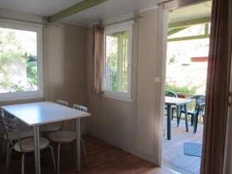 Camping Le Colporteur 4*, Camping 4* à Le Bourg d'Oisans (Isère) - Location Chalet pour 4 personnes - Photo N°5