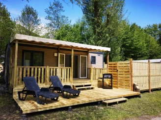 Camping Le Colporteur 4*, Camping 4* à Le Bourg d'Oisans (Isère) - Location Mobil Home pour 4 personnes - Photo N°1
