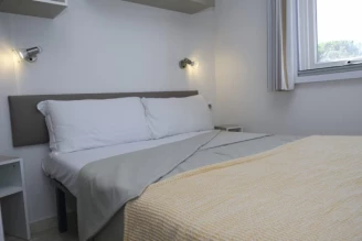 Camping Torre del Porticciolo 4*, Camping 4* à Alghero (Sassari) - Location Mobil Home pour 4 personnes - Photo N°7