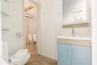 Camping Torre del Porticciolo 4*, Camping 4* à Alghero (Sassari) - Location Mobil Home pour 4 personnes - Photo N°9