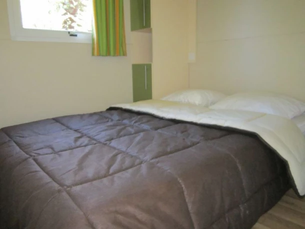 Camping Le Colporteur 4*, Camping 4* à Le Bourg d'Oisans (Isère) - Location Chalet pour 6 personnes - Photo N°6