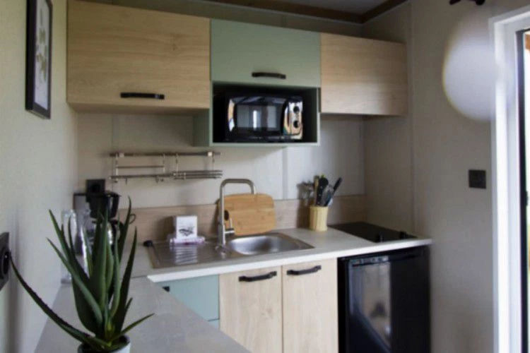 , Camping 4* à Sainte Marie du Mont (Manche) - Location Chalet pour 2 personnes - Photo N°1