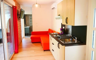 Camping Les Castors 4*, Camping 4* à Burnhaupt le Haut (Haut Rhin) - Location Maison pour 2 personnes - Photo N°4